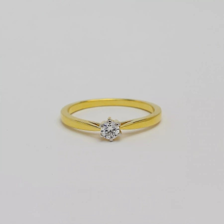 Pierścionek z brylantem 0,15 ct