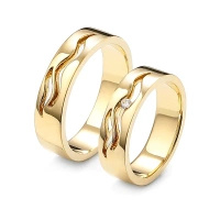 Obrączki ślubne z brylantem 0,03 ct