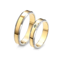 Obrączki ślubne ze szmaragdem 0,02 ct