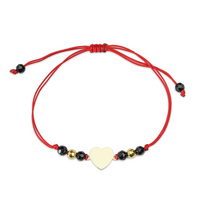 Bransoletka złota na sznurku Au 585 - serce